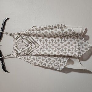 About A Girl flowy triangle tank